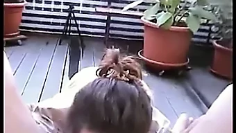 Arousing older woman engages in intimate acts on her private terrace