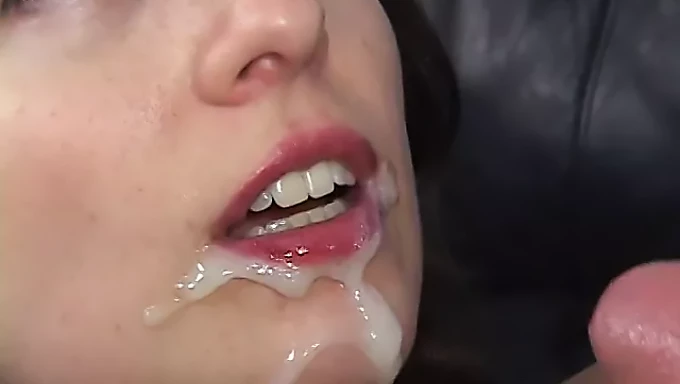 A young woman enjoys giving oral sex and having intercourse with a large penis in various positions, showcasing her skills with a cumshot finale.