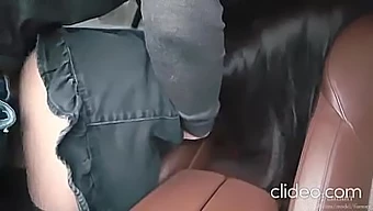 Young Woman Engages In Sexual Activity Inside A Vehicle